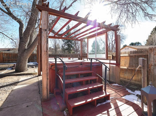 view of patio featuring a hot tub and a pergola