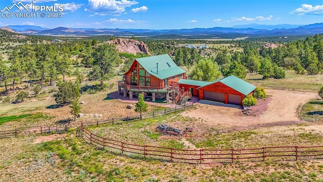 bird's eye view with a rural view and a mountain view