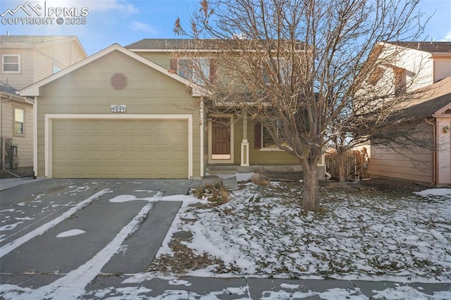 view of front of home with a garage