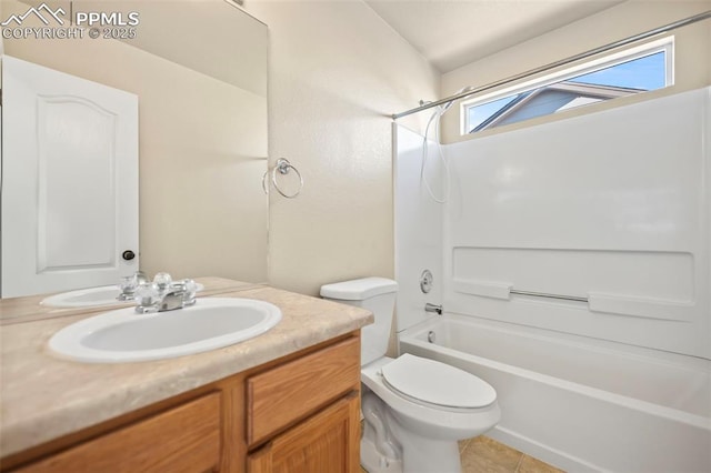 full bathroom with tile patterned flooring, toilet, vanity, and shower / washtub combination