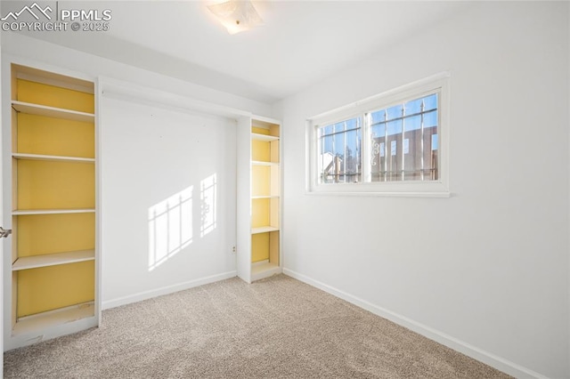 unfurnished room with carpet