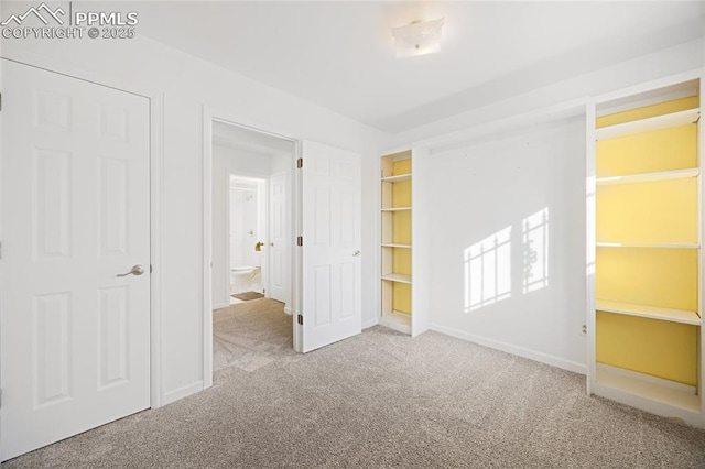 unfurnished bedroom with light carpet