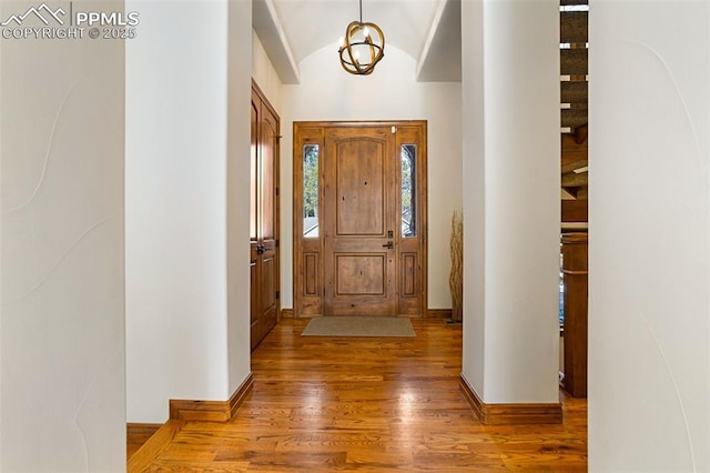 foyer entrance featuring hardwood / wood-style flooring