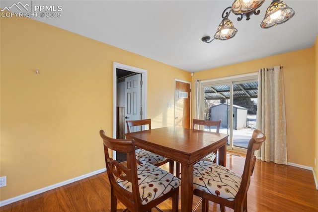 dining room featuring wood-type flooring