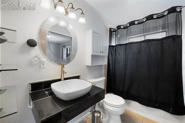 bathroom featuring sink and toilet