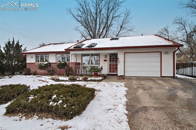 ranch-style home with a garage