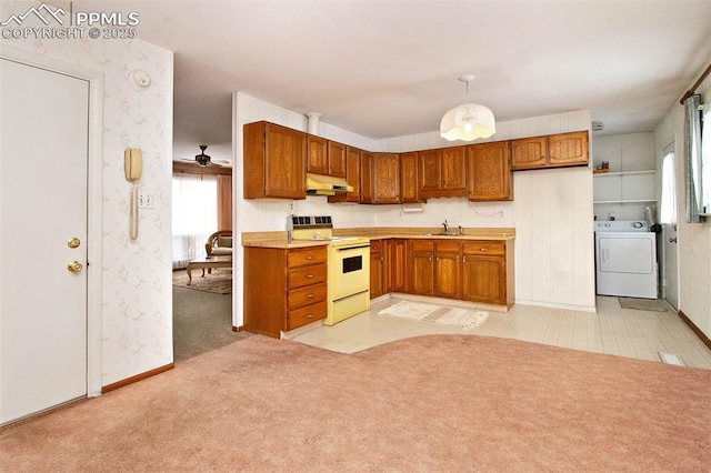 kitchen with washer / dryer, sink, light carpet, and white range with electric stovetop