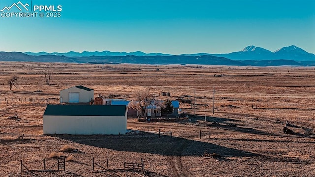 property view of mountains featuring a rural view