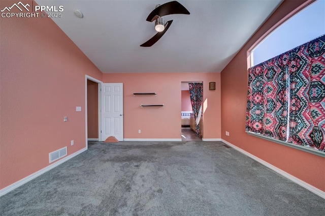 interior space featuring vaulted ceiling and ceiling fan