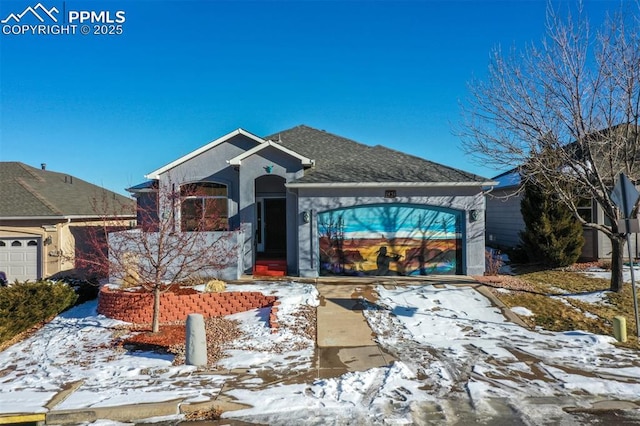 view of front of property with a garage