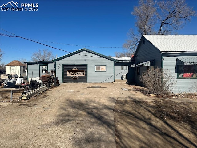 exterior space featuring a garage