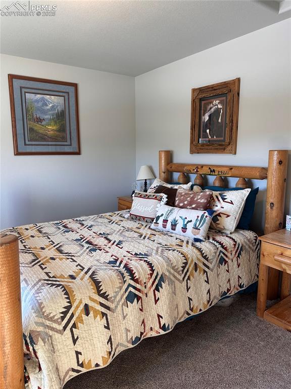 bedroom featuring carpet floors