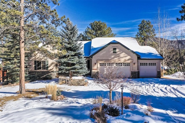 view of front of home with a garage