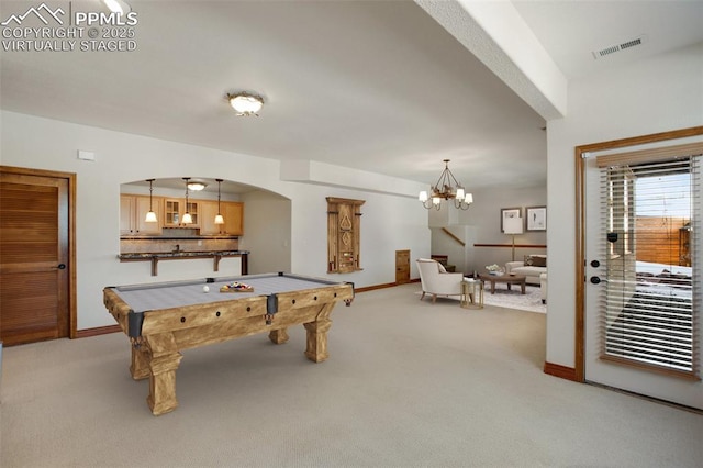 game room featuring light carpet, a chandelier, and billiards