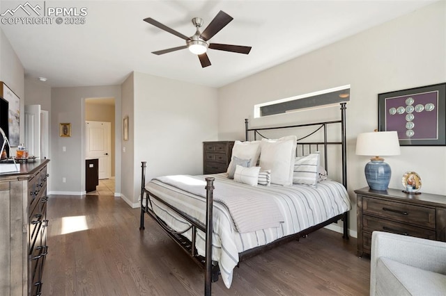 bedroom featuring dark wood-type flooring and ceiling fan