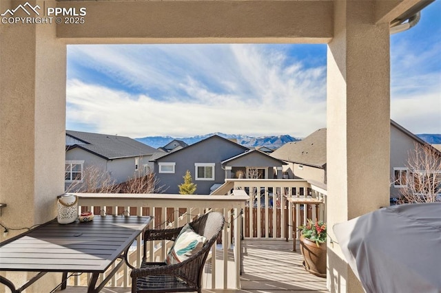 balcony featuring a mountain view and area for grilling