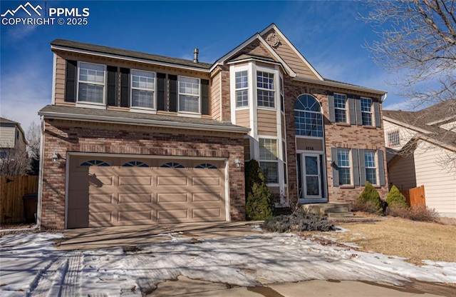 view of front of home with a garage