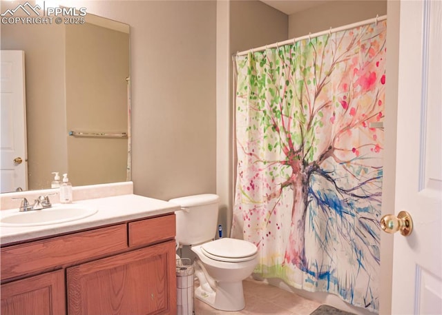 bathroom with vanity, curtained shower, tile patterned floors, and toilet