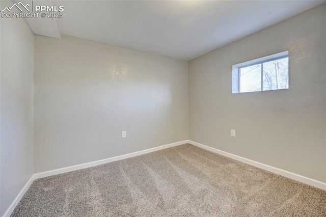 view of carpeted spare room