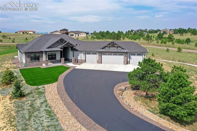 craftsman inspired home with a front lawn and a garage