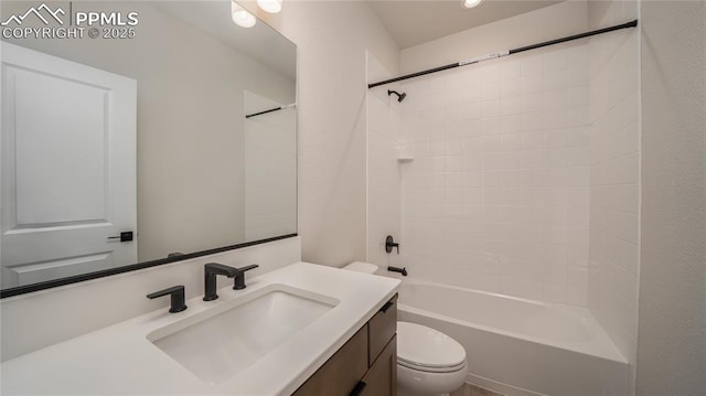 bathroom with  shower combination, vanity, and toilet