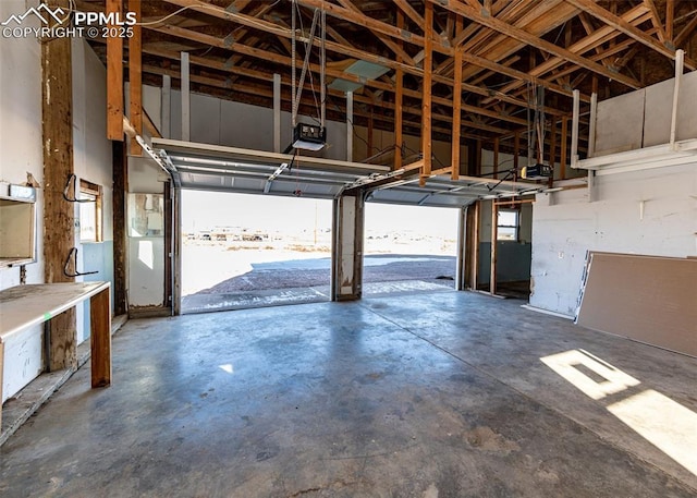 garage featuring a garage door opener