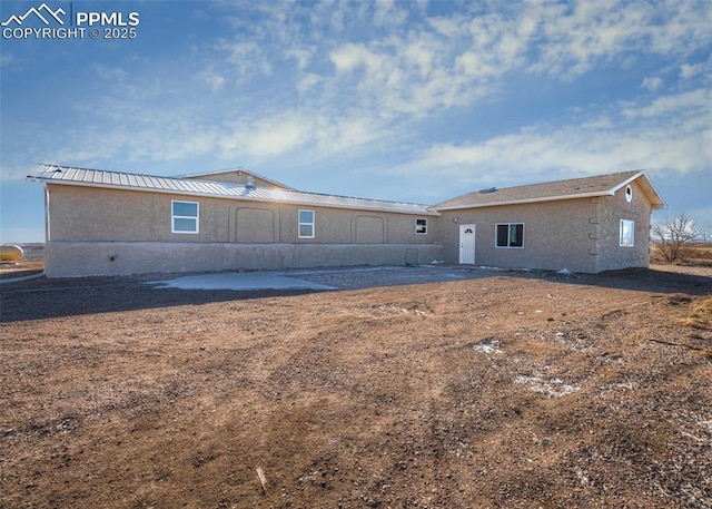 back of house featuring a patio area