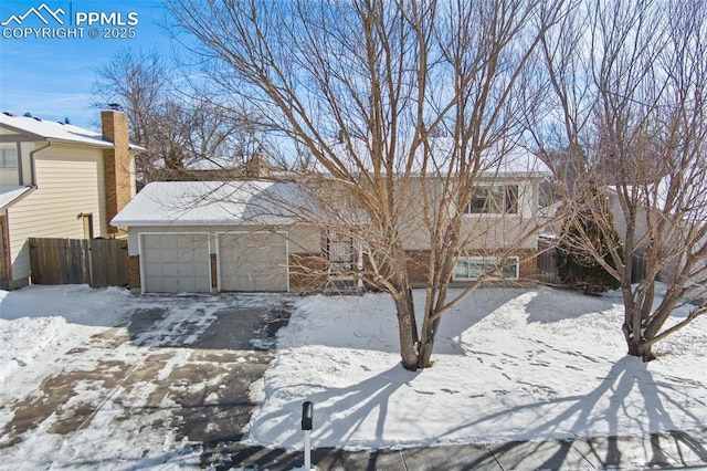 view of front of house with a garage