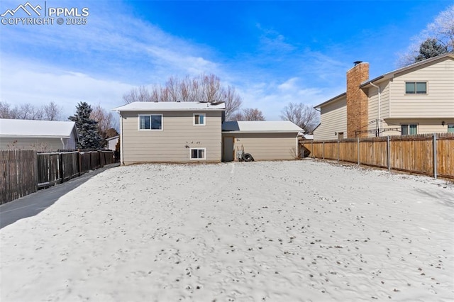 view of snow covered property