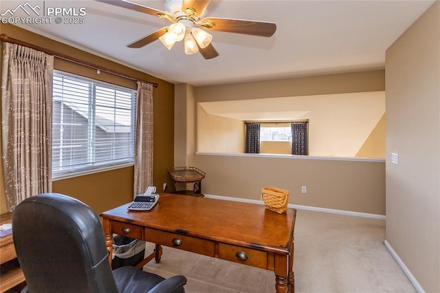 office featuring carpet floors and ceiling fan