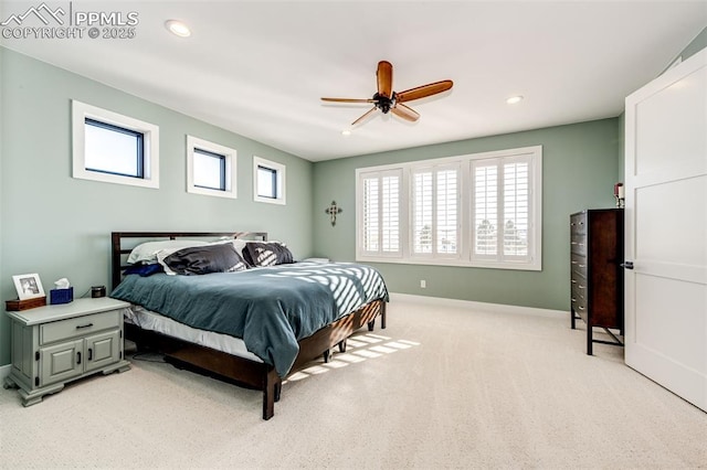 carpeted bedroom featuring ceiling fan