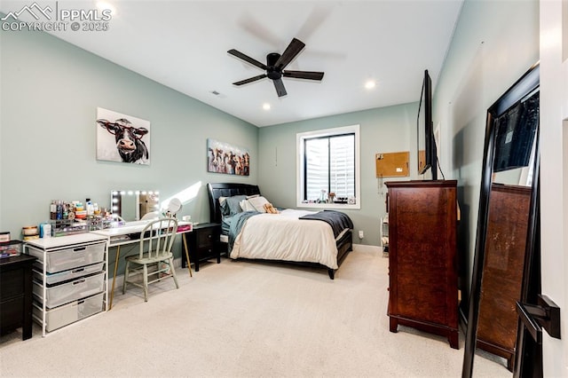 carpeted bedroom featuring ceiling fan