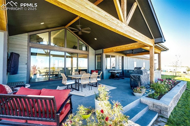 view of patio / terrace with ceiling fan and an outdoor living space