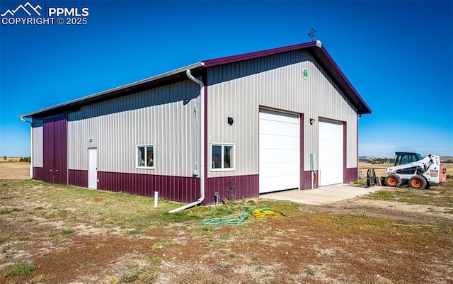 view of outdoor structure with a garage