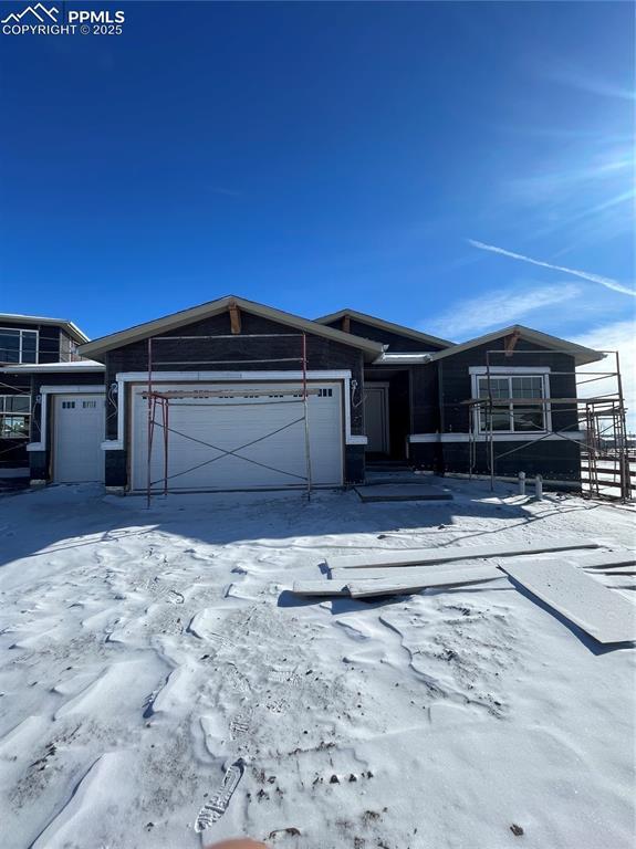 9307 Gallery Pl, Colorado Springs, CO 80924 - view of front of home featuring a garage