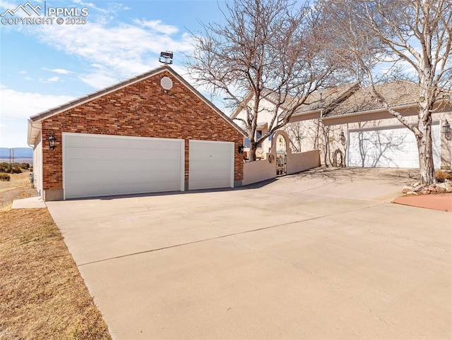 view of property exterior featuring a garage