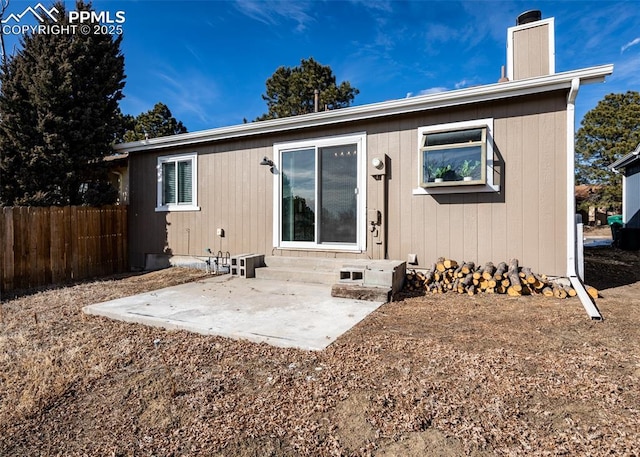 rear view of property featuring a patio area