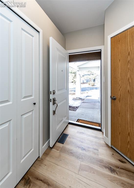 foyer featuring light hardwood / wood-style flooring