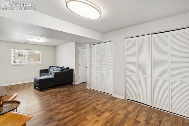 living area featuring dark hardwood / wood-style floors