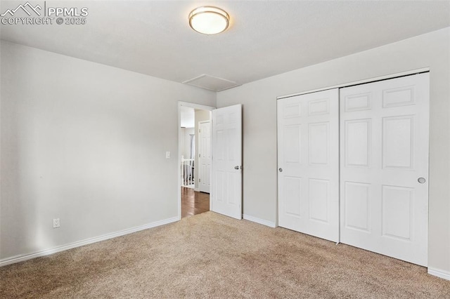 unfurnished bedroom featuring a closet and carpet