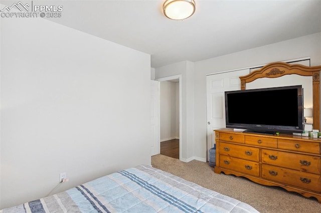 bedroom featuring light colored carpet