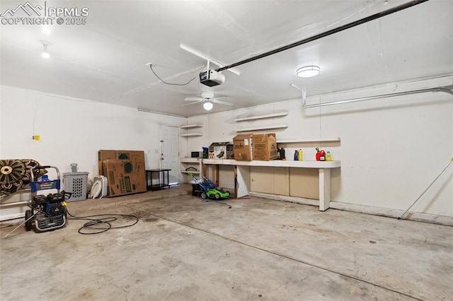 garage featuring a workshop area and a garage door opener