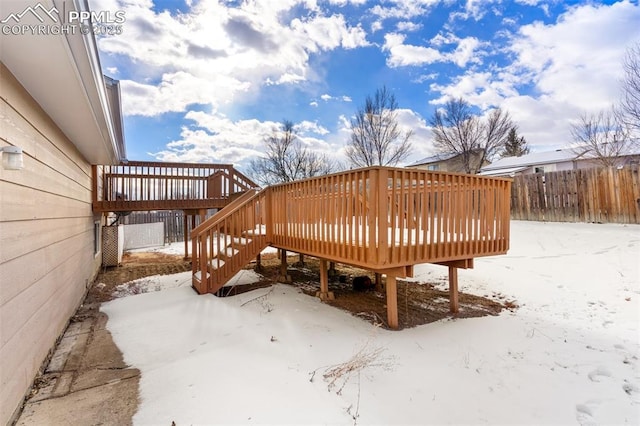 view of snow covered deck