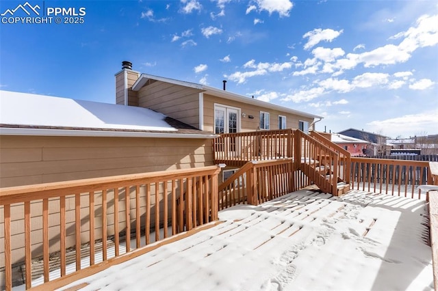 view of snow covered deck