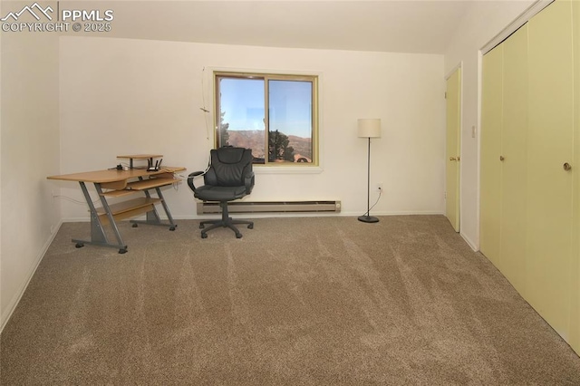 unfurnished office with carpet and a baseboard heating unit