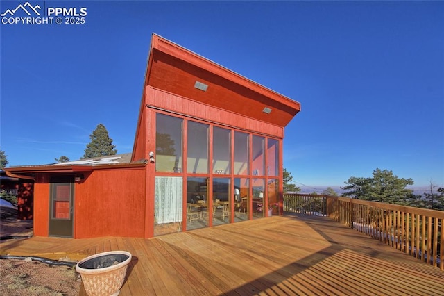 deck featuring a sunroom