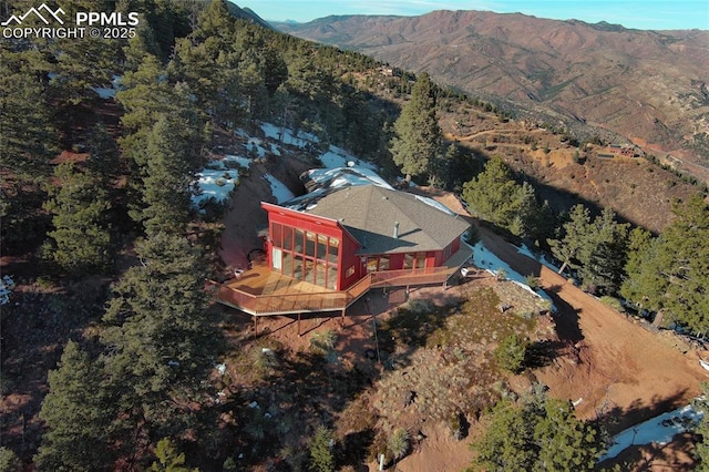 drone / aerial view featuring a mountain view