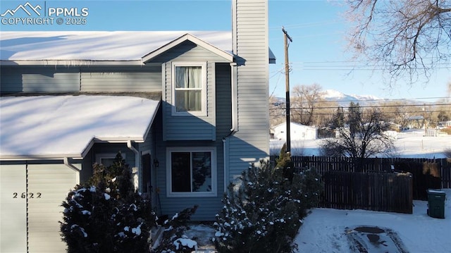 view of snow covered property