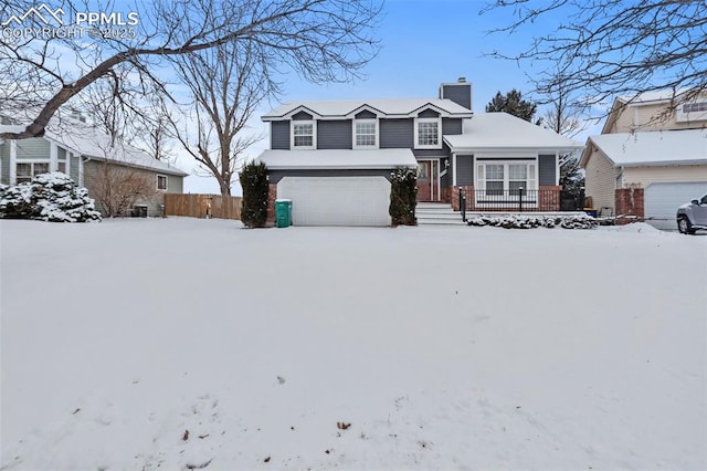 view of front of property featuring a garage