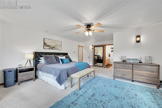 bedroom with ceiling fan and light colored carpet